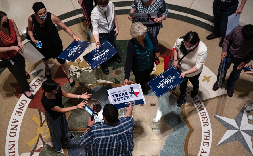 People opposed to the Texas Republican-led effort to pass new voting restrictions gather at the state capitol on July 10 in Austin.