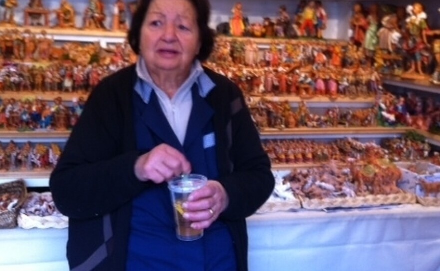 Anna Alferoni, 80, runs the oldest stall in Piazza Navona, site of Rome's most popular Christmas market. This year, she's having trouble selling even relatively inexpensive Nativity scene figurines.