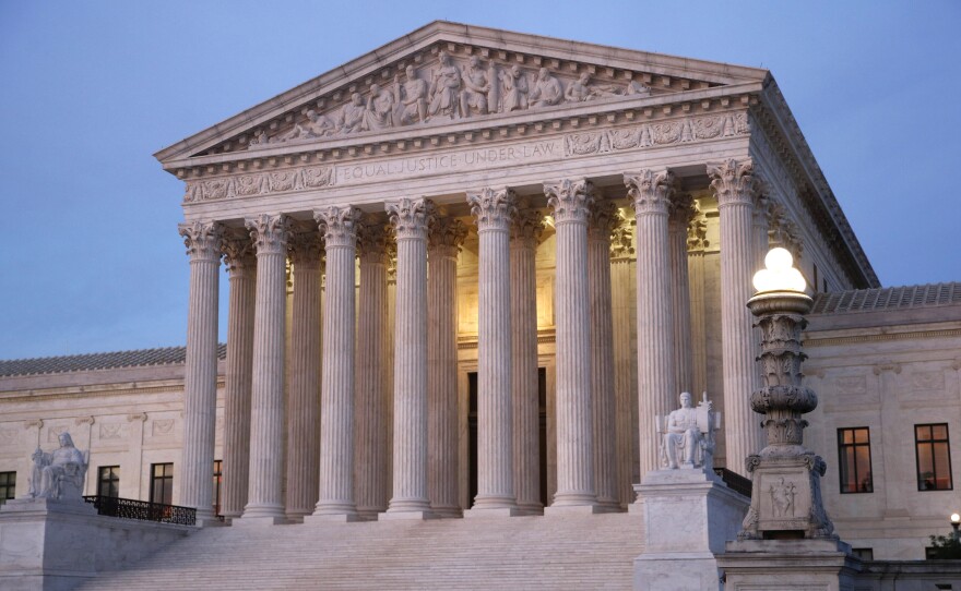 In this May 23, 2019 file photo, the U.S. Supreme Court building at dusk on Capitol Hill in Washington.