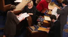 Congressional clerks help unseal and organize the Electoral College votes from all 50 states in the U.S. House of Representatives on Jan. 4, 2013. 