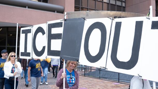 Protestors gather outside the federal building calling federal immigration agents to stop overstepping their authority on November 20, 2025.