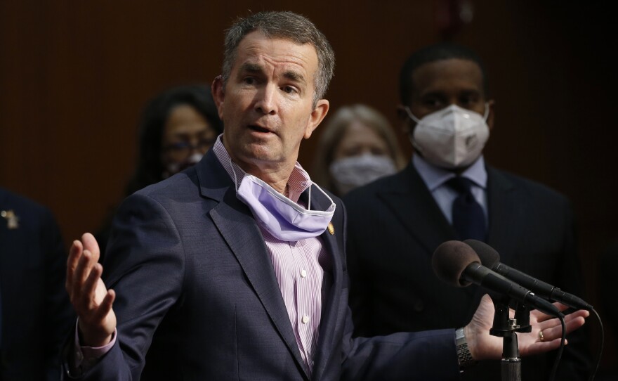 Virginia Gov. Ralph Northam speaks during a news conference in Richmond, Va. on June 4. Virginia has rolled out a smartphone app to automatically notify people if they might have been exposed to the coronavirus.