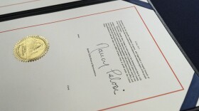 The signature of House Speaker Nancy Pelosi of Calif., is on the article of impeachment against President Donald Trump, after an engrossment ceremony before transmission to the Senate for trial on Capitol Hill, in Washington, Wednesday, Jan. 13, 2021.