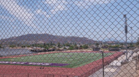 Santana High School's football field, on the east side of campus, is shown through a chain link fence on Aug. 12, 2026.
