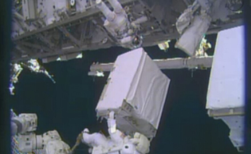 Astronauts Mike Hopkins and Rick Mastracchio replace a pump on the International Space Station during a spacewalk last month.