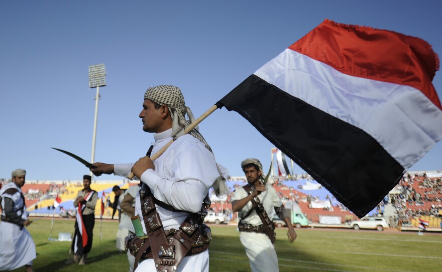 Supporters of Houthi Shiites, who took over the government of Yemen and installed a new committee to govern, dance with traditional daggers at a rally in support of the Houthis, at a sports stadium in Sanaa, Yemen, Saturday, Feb. 7, 2015.