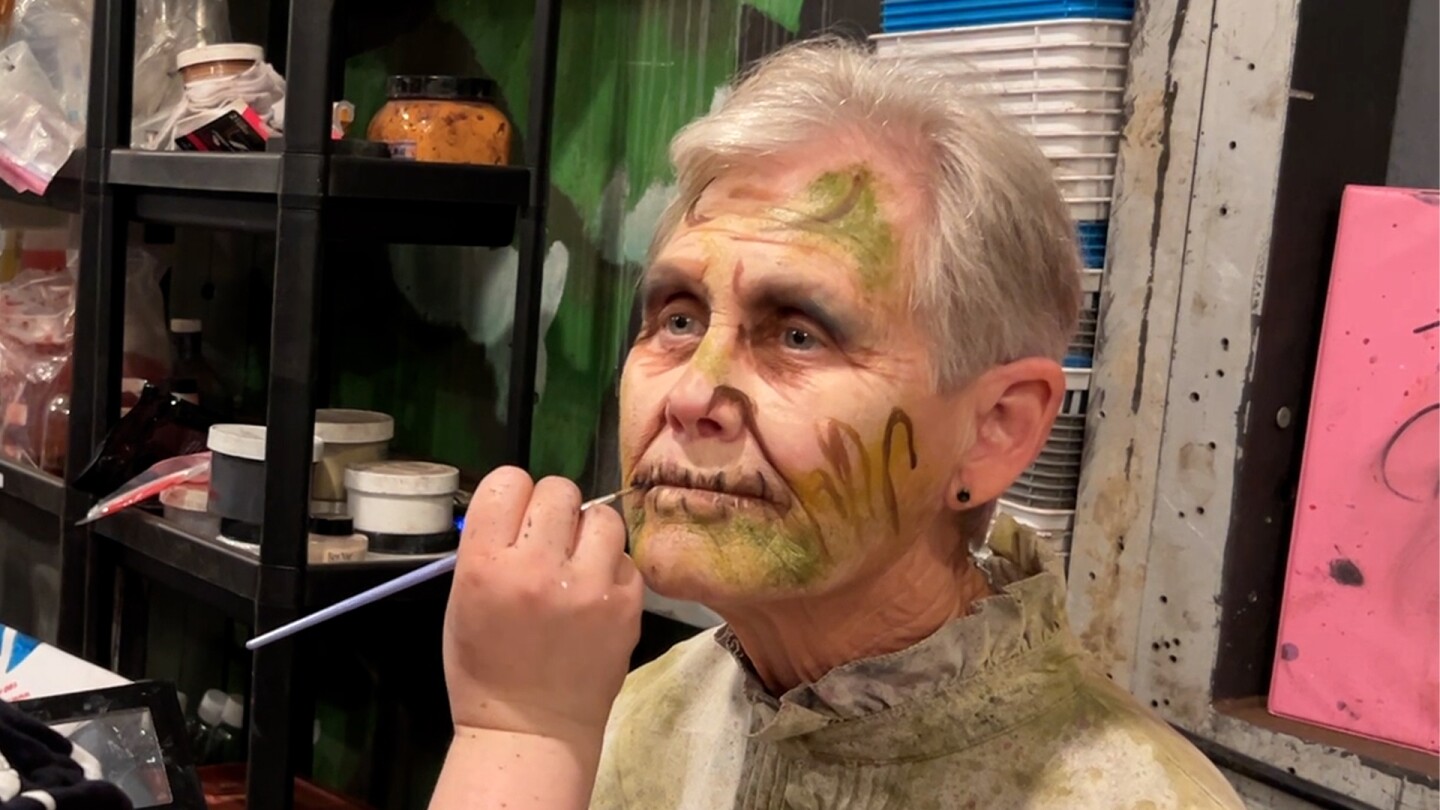 Scare actor Patty Fay in the make up chair before taking her place in the graveyard at the Haunted Trail of Balboa Park. Sept. 25, 2025.