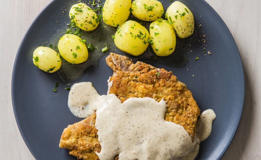 Pan-Fried Pork Chops with Milk Gravy and potatoes