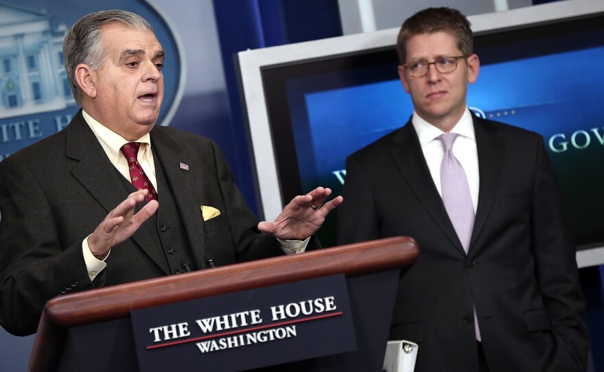 Transportation Secretary Ray LaHood (left) answers questions during a briefing with White House Press Secretary Jay Carney on Friday.