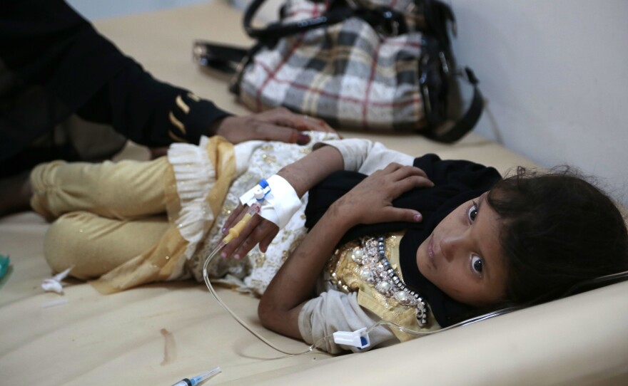A girl is treated for a suspected cholera infection last month at a hospital in Sanaa, Yemen.