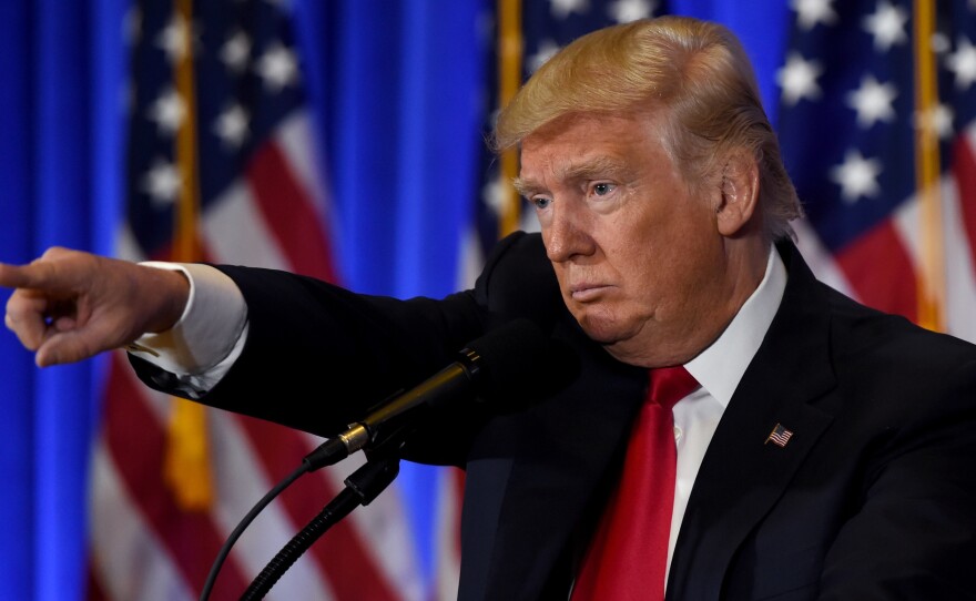 US President-elect Donald Trump calls on a reporter during a press conference January 11, 2017 at Trump Tower in New York.