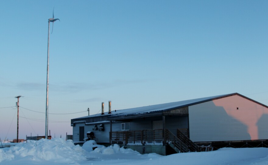 Shishmaref Tannery from the outside. A small wind turbine beside it adds supplemental power, which slightly lessens the high fuel costs of keeping the building warm during the short three-month season it is operating.