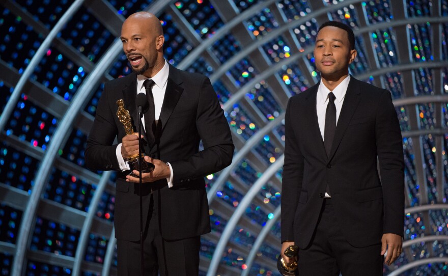 Common and John Legend accept the Oscar for Best Original Song for work in “Selma” at the 87th annual Academy Awards, Feb. 22, 2015.