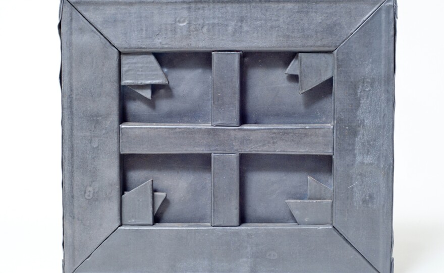 Russell Baldwin, "Sculpture Of A Painting, Variation #4," 1980, lead over wood, 8-1/8" x 9-1/4". Private Collection. Photo: Chip Morton. This variation from Baldwin's series is not displayed in the library but shares the same materials and methods as Variations #1 and #2, which can be seen on the eighth floor of the library.