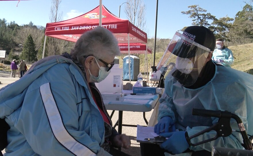 80-year-old Tera Parker gets a COVID-19 vaccine outside the Julian Library, Feb. 3rd, 2021.