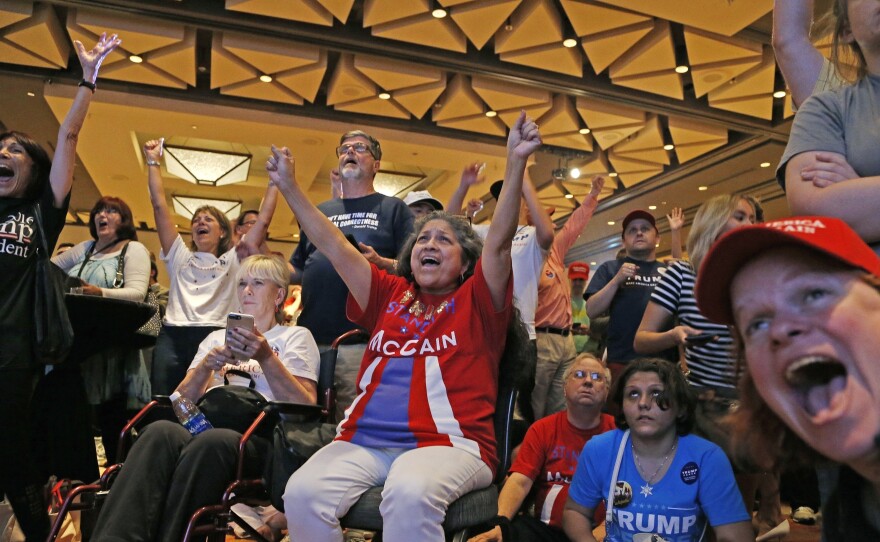 Supporters of Trump celebrate election results in Phoenix on Tuesday.