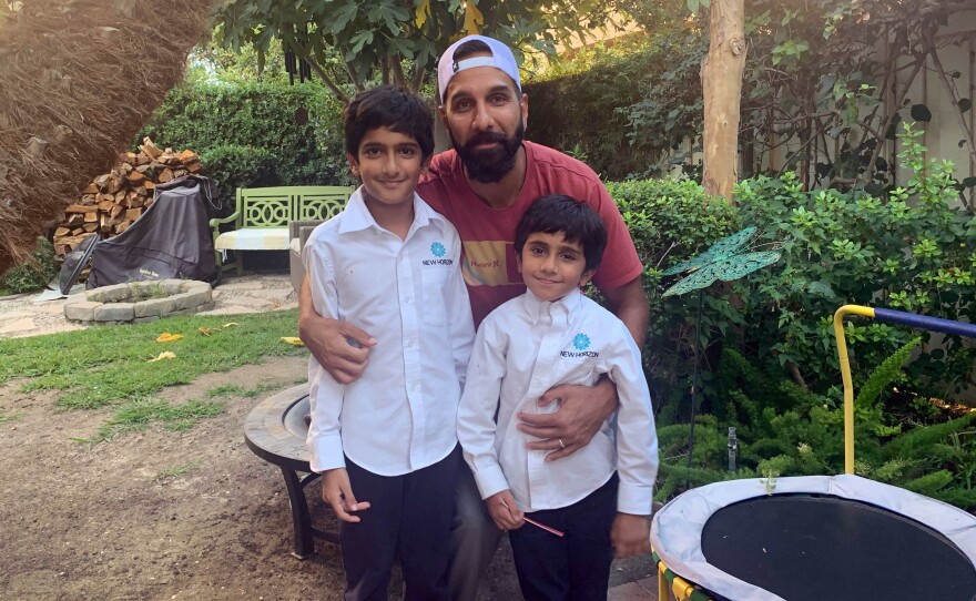 Ali Malik, 37, with his sons Muhammad Binyamin, 9, and Layth Noah, 5. Malik is part of a class action lawsuit against the FBI alleging religious discrimination and violations of surveillance laws.
