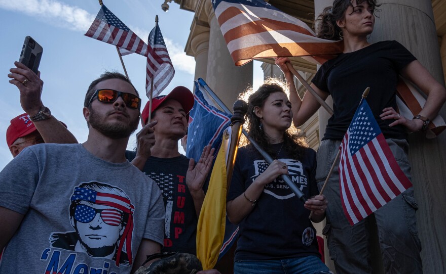 LANSING: Supporters of US President Donald Trump rally at the State Capitol in Lansing, Michigan, on November 7, 2020, after Democratic Presidential nominee Joe Biden was declared the winner of the 2020 US elections.