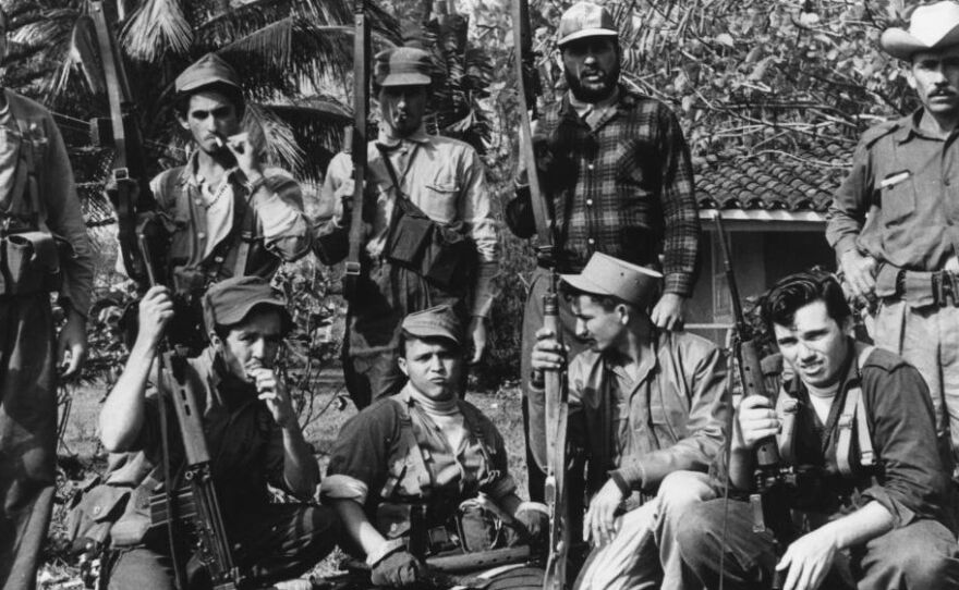 Members of Fidel Castro's militia gather in Cuba's Escambry Mountains during the ill-fated 1961 Bay of Pigs invasion.