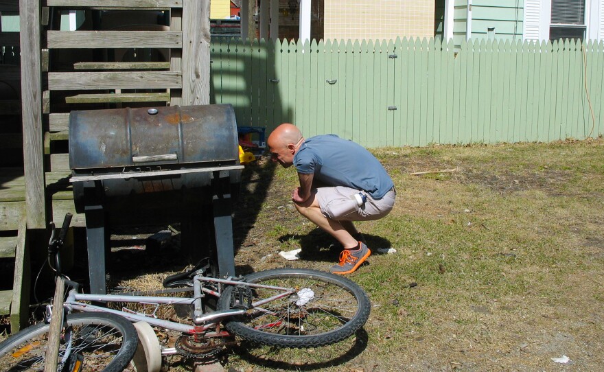 Volunteer Patrick Pezzati searches yards in Turners Falls, Mass., for discarded heroin needles.