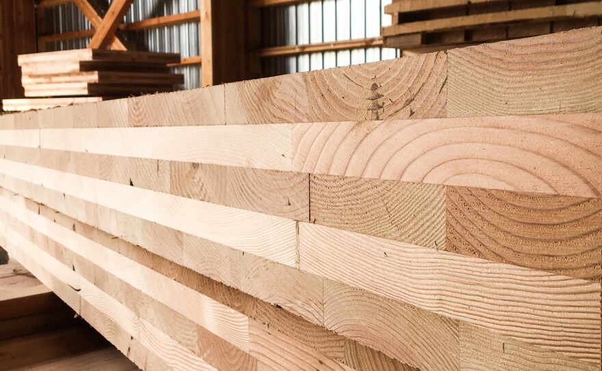 Panels of cross laminated timber at DR Johnson. CLT is a pretty simple concept. You lay down a layer of boards length-wise, then a layer on top width-wise, then another layer the first direction.