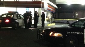 Police respond to a robbery at the Clairemont AM/PM that left one customer dead, April 16, 2015. 