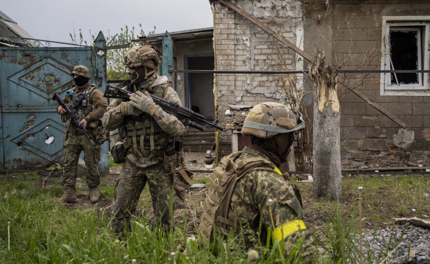 Ukrainian National Guard patrol during a reconnaissance mission in a recently retaken village on the outskirts of Kharkiv, east Ukraine, on Saturday.