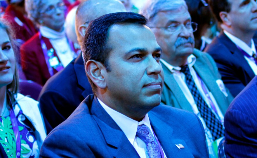 Ralph Alvarado, the first Hispanic elected to a state office in Kentucky, watches the stage on Tuesday evening. Alvarado will speak at the Republican National Convention during prime time Wednesday.