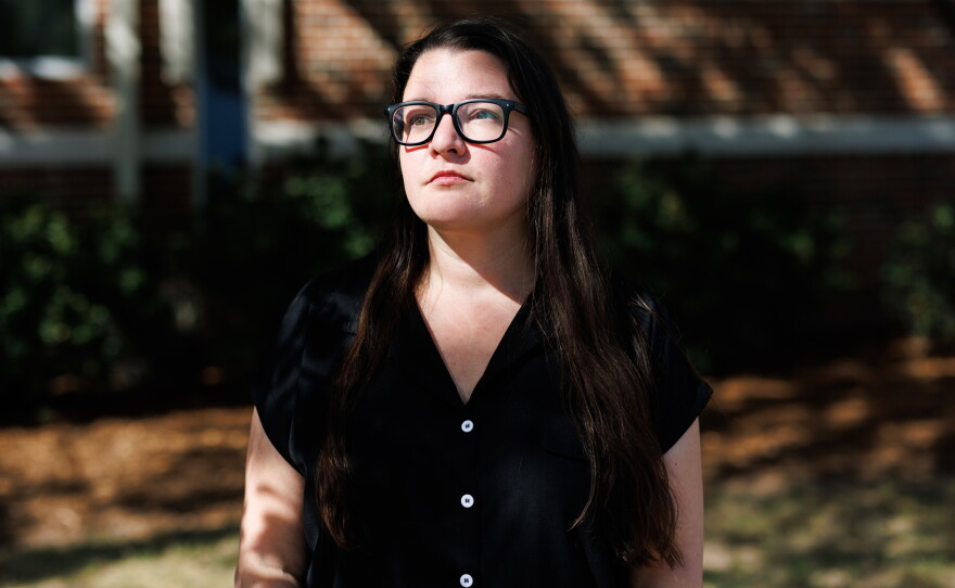 Leigh Mazur, with the Durham Community Safety Department, stands for a portrait outside the building where the HEART program operates.