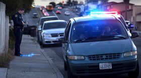 A San Diego police officer pulls over a driver in Valencia Park in this undated photo.