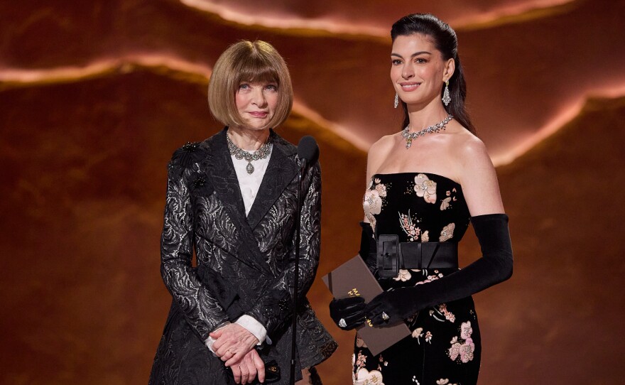 Dame Anna Wintour and Anne Hathaway present the Oscar® for Makeup and Hairstyling to Jordan Samuel, Mike Hill, and Cliona Furey during the 98th Oscars® at the Dolby® Theatre at Ovation Hollywood on Sunday, March 15, 2026.