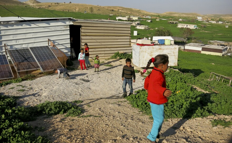 Children play at a Bedouin camp in the Jordan Valley, West Bank. The camp is located in Area C, the 60 percent of the West Bank under exclusive Israeli control.