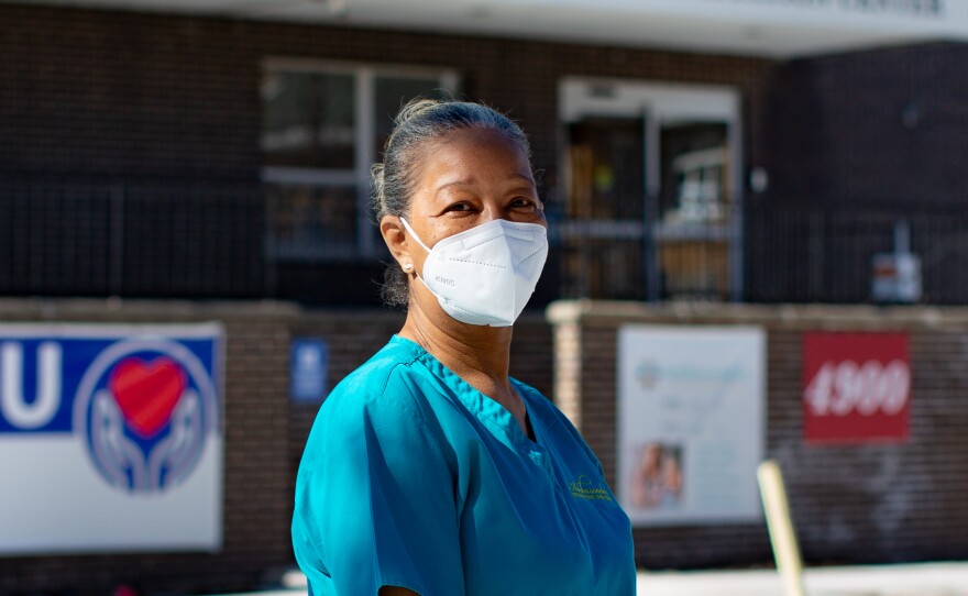 Nurse's aide Patricia Johnson has worked for the Ambassador Nursing and Rehabilitation Center on the north side of Chicago for nearly 24 years. The pandemic has been grueling on her and her colleagues. "The hardest part is watching people die alone without their families," says Johnson, who now sometimes works double shifts due to staff shortages.