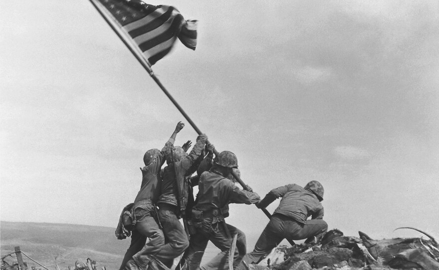 U.S. Marines raise the American flag atop Mount Suribachi, Iwo Jima, on Feb. 23, 1945. The generation who fought in World War II is often called the GI generation or the greatest generation.