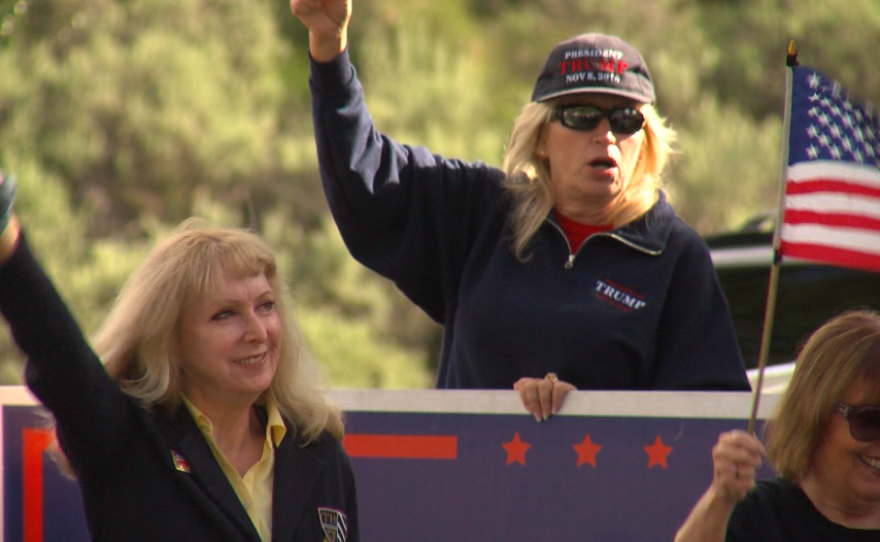 Patti Siegmann (center) rallies with other women in support of President Trump and Darrell Issa (R-Vista) in front of the Congressman's Vista office, Feb. 21, 2017.