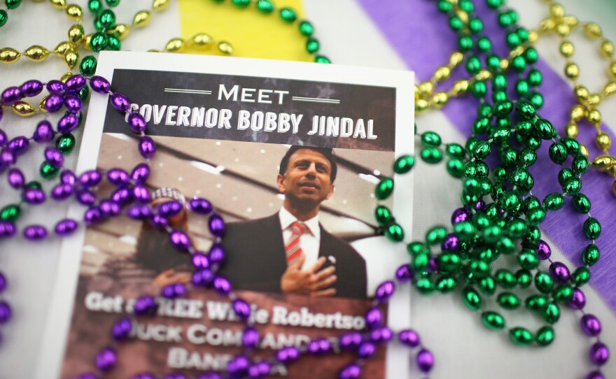 Campaign material for Louisiana Governor Bobby Jindal sits on a table at the Republican Party of Iowa's Lincoln Dinner.