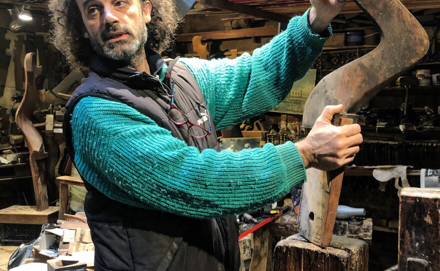 Master artisan Paolo Brandolisio, one of only four remaining makers of oars and oar posts for the city's legendary gondolas, is trying to put his workshop back in order after the floods.