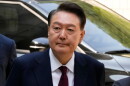 South Korea's ousted former President Yoon Suk Yeol arrives to attend his trial at the Seoul Central District Court in Seoul, South Korea, May 12, 2025.