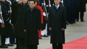 Vice President Joseph Biden welcomes Chinese President Hu Jintao to Andrews Air Force Base on Tuesday. Analysts say the Chinese leader's visit could be among the most pivotal in U.S. history. Hu meets with President Obama on Wednesday.