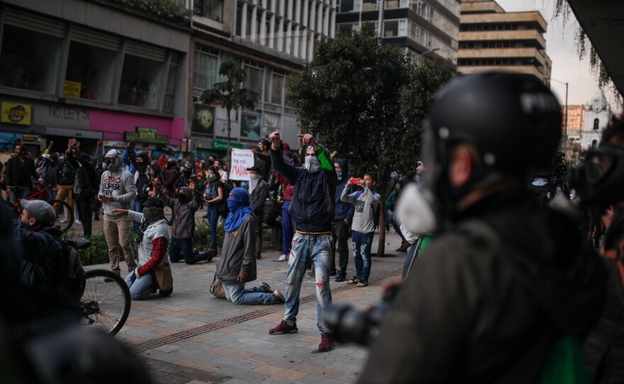 Anti-government protesters rally on Friday in Bogotá, the second day of their protests against President Iván Duque, who is trying to get a grip on the unrest by announcing a "national dialogue."
