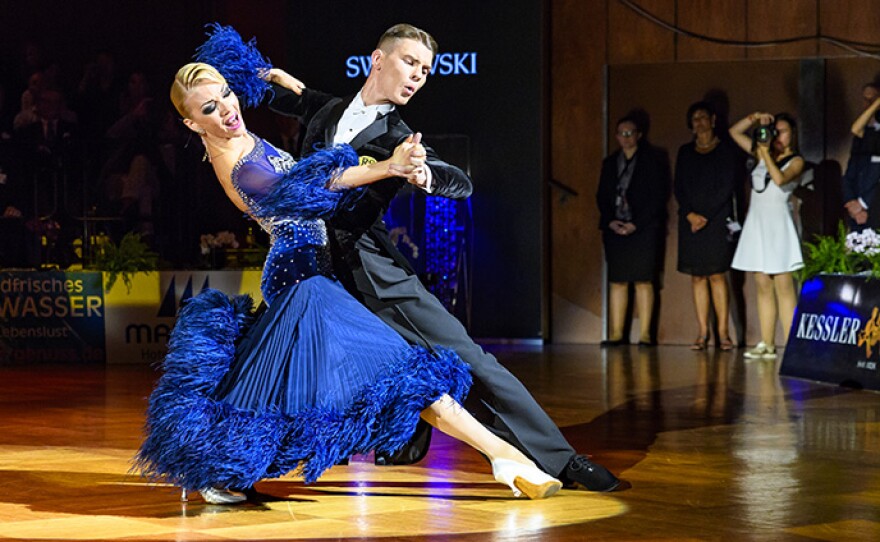 Dancers Olga Kulikova and Dmitry Zharkov of Russia. The WORLD DANCESPORT GRANDSLAM SERIES is back, featuring the best competitive dancers in the world vying for the most prestigious titles and the prize money in the world of dance.
