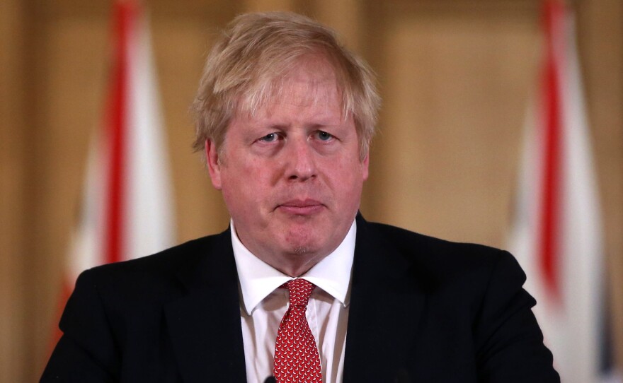 British Prime Minister Boris Johnson, seen on March 22, tested positive for the coronavirus 10 days ago. He's been admitted to a hospital for testing.