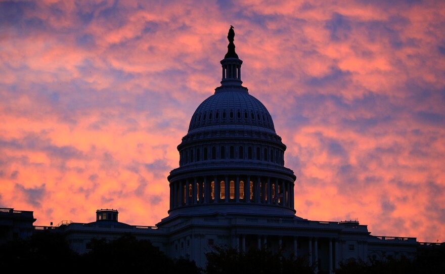 Filmmaker Ken Burns says America is "defined as much by our challenges and the dark moments as we are by our successes." You can explore U.S. history <a href="https://www.pbs.org/kenburns/unum">in scenes selected from more than 40 documentaries at Burns' UNUM site.</a> Above, the sun rises behind the U.S. Capitol in Washington.