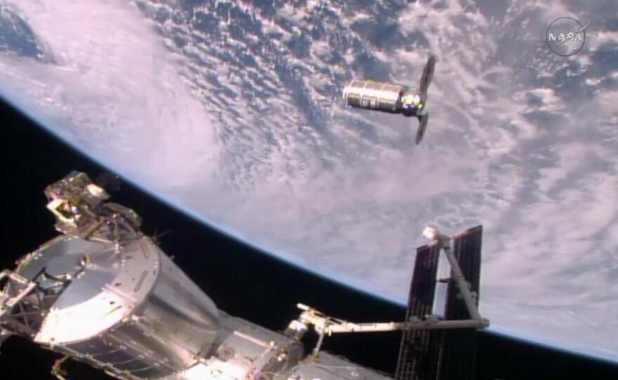 The Cygnus resupply craft slowly approaches the International Space Station — and its waiting robotic arm, the Canadarm2 — Sunday morning.