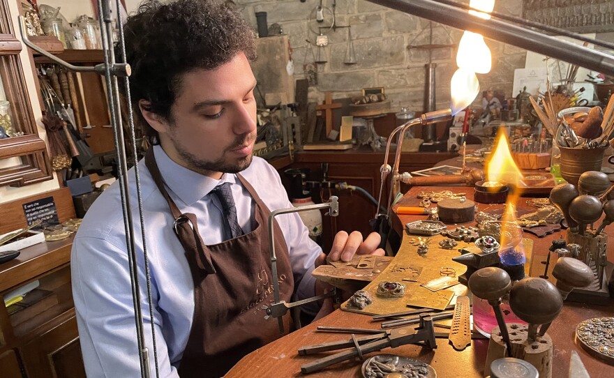 A goldsmith in his workshop in Tuscany.