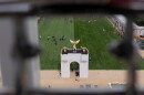 A mock-up of President Trump's proposed triumphal arch, pictured during the state fair on D.C.'s National Mall in June. The real thing needs to undergo a historic preservation review before it can be approved.