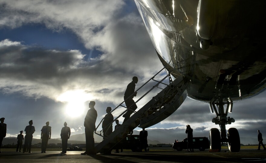 President Obama boards Air Force One during a refueling stop Nov. 18 in the Portuguese islands of Azores.
