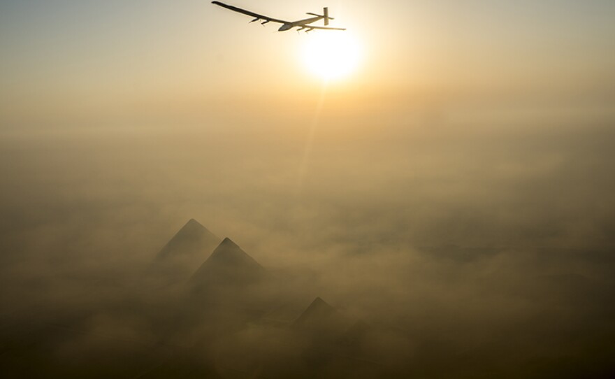 Solar Impulse flying over the pyramids. (undated photo)