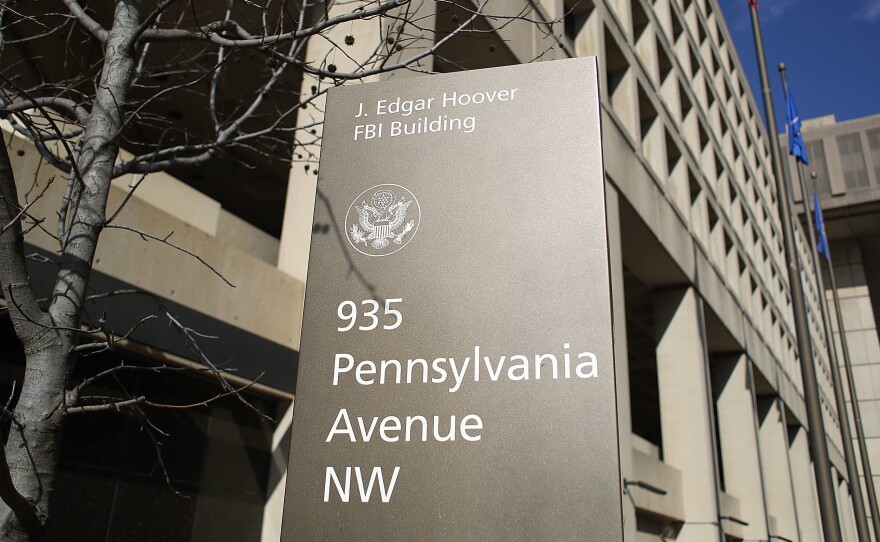 FBI leaders hoped to move to a larger new headquarters outside of Washington, but a new plan would replace the current headquarters on the same site. Democrats want more information.