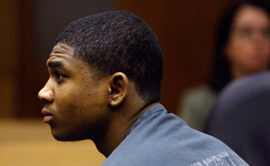 Davontae Sanford, sitting in a Detroit courtroom in 2010, was charged with assault during an incident in a youth detention facility.
